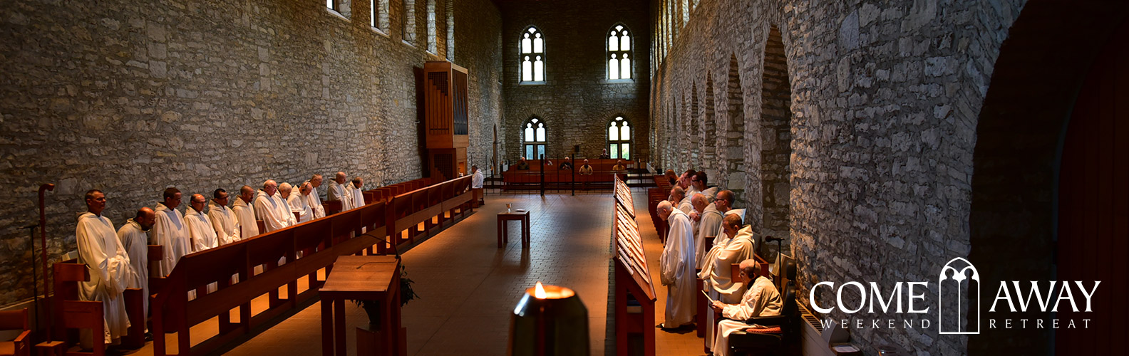 monks in choir in large stone church, text says come away weekend retreat 