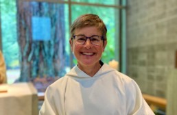 Sister Gertrude's Solemn Profession, smiling in new white cowl