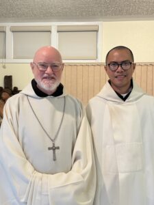 Abbot Paul-Mark and Brother Simon smile 